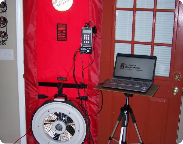 A blower door set up in a front doorway to test for air leaks
